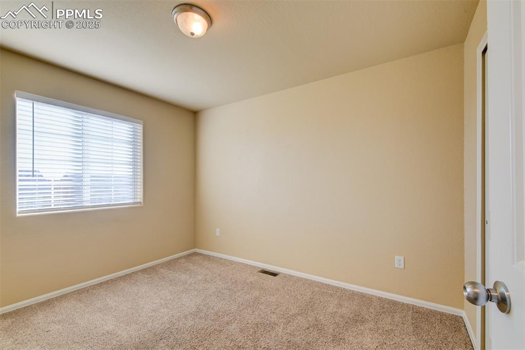 Image 25 of 33: 2nd bedroom