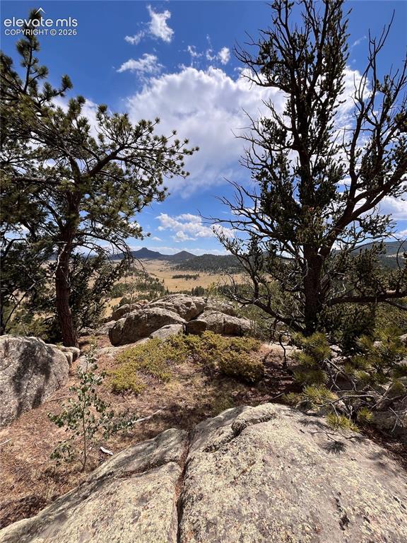 Image 13 of 17: Expansive natural natural patio atop the boulder