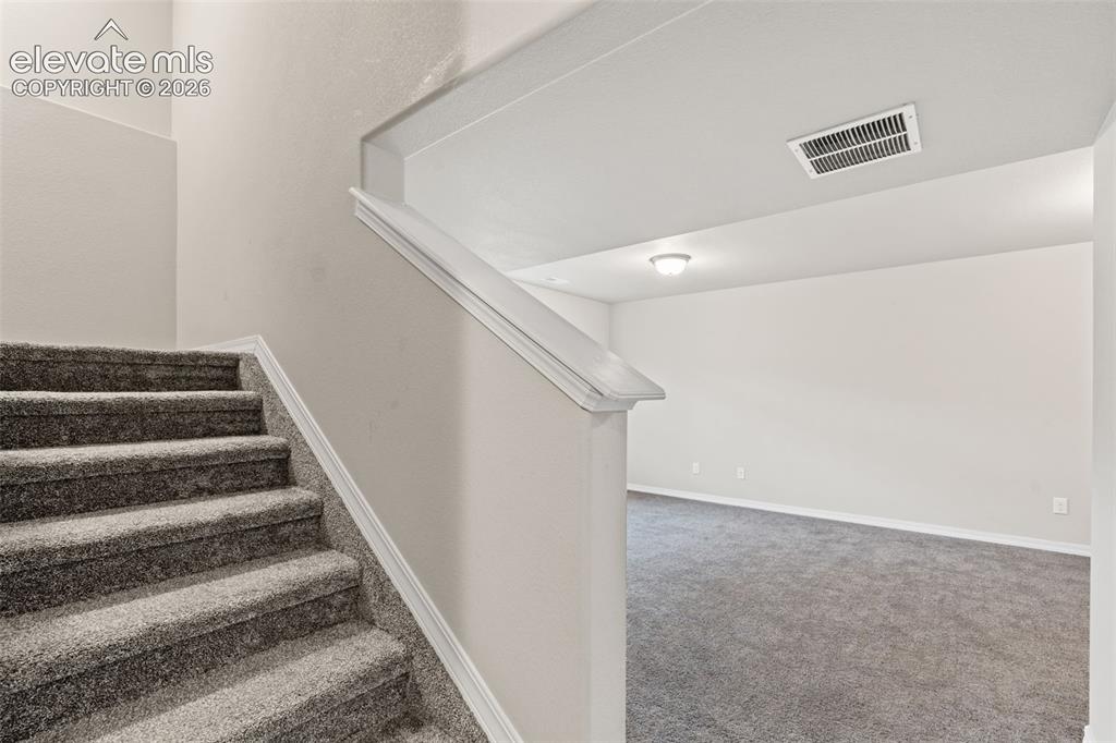 Image 35 of 45: Stairs to basement
