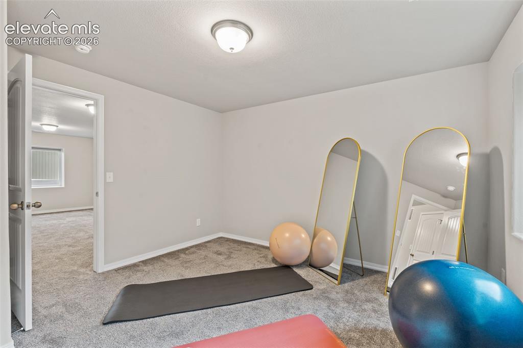 Image 39 of 45: Basement Bedroom