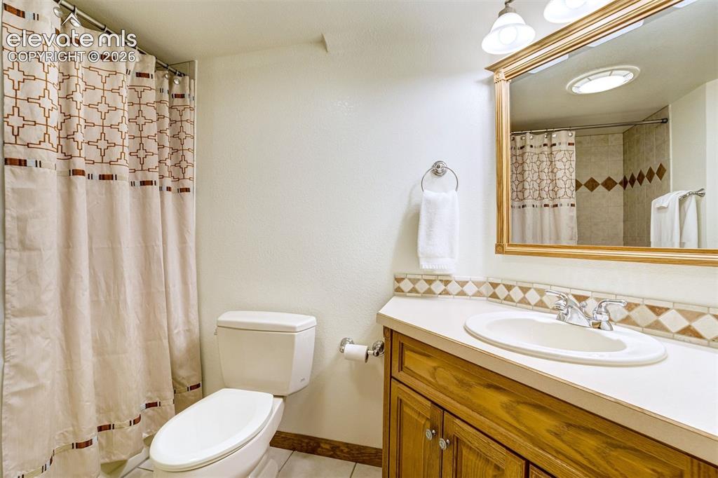 Image 39 of 50: Full bathroom in basement
