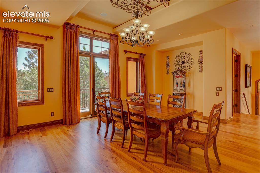 Image 12 of 50: Formal dining room.