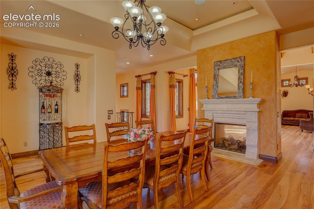 Image 13 of 50: Formal dining room.