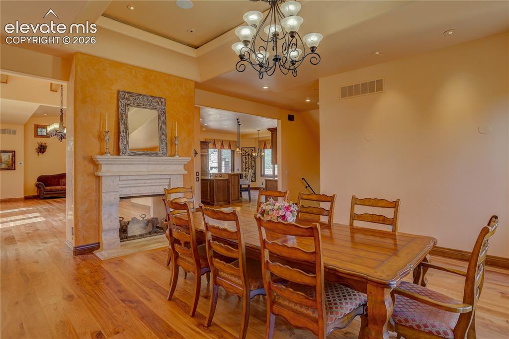 Image 14 of 50: Formal dining room.