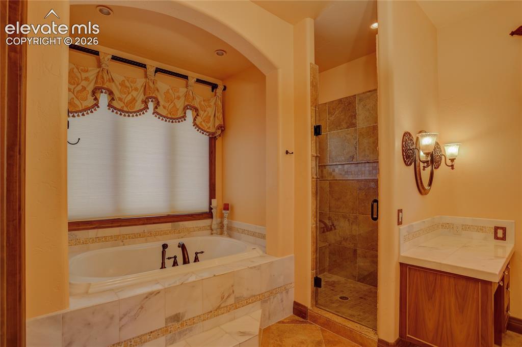 Image 24 of 50: Primary ensuite bathroom.