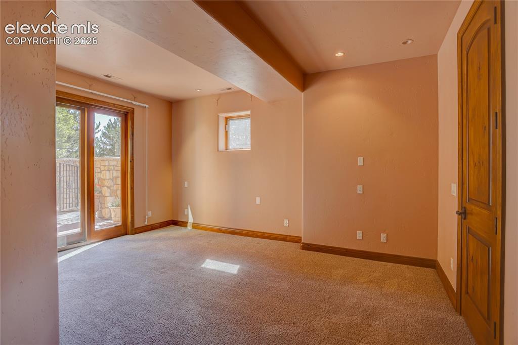 Image 40 of 50: 3rd lower level bedroom.