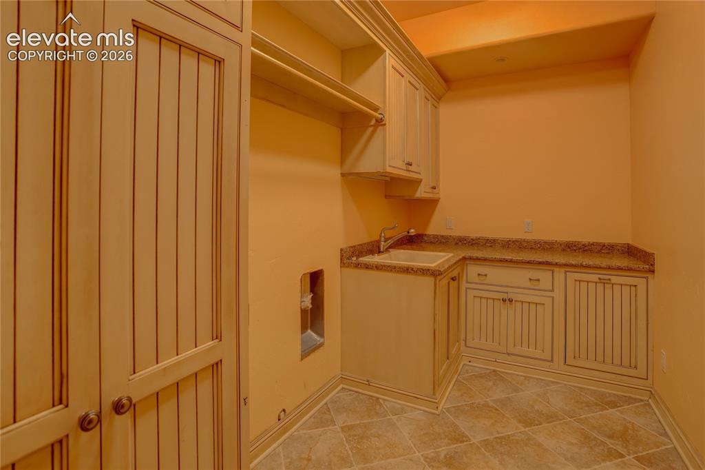 Image 41 of 50: Lower level laundry.