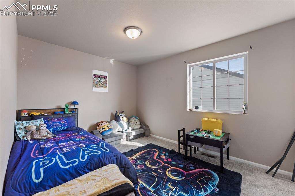 Image 20 of 34: Bedroom