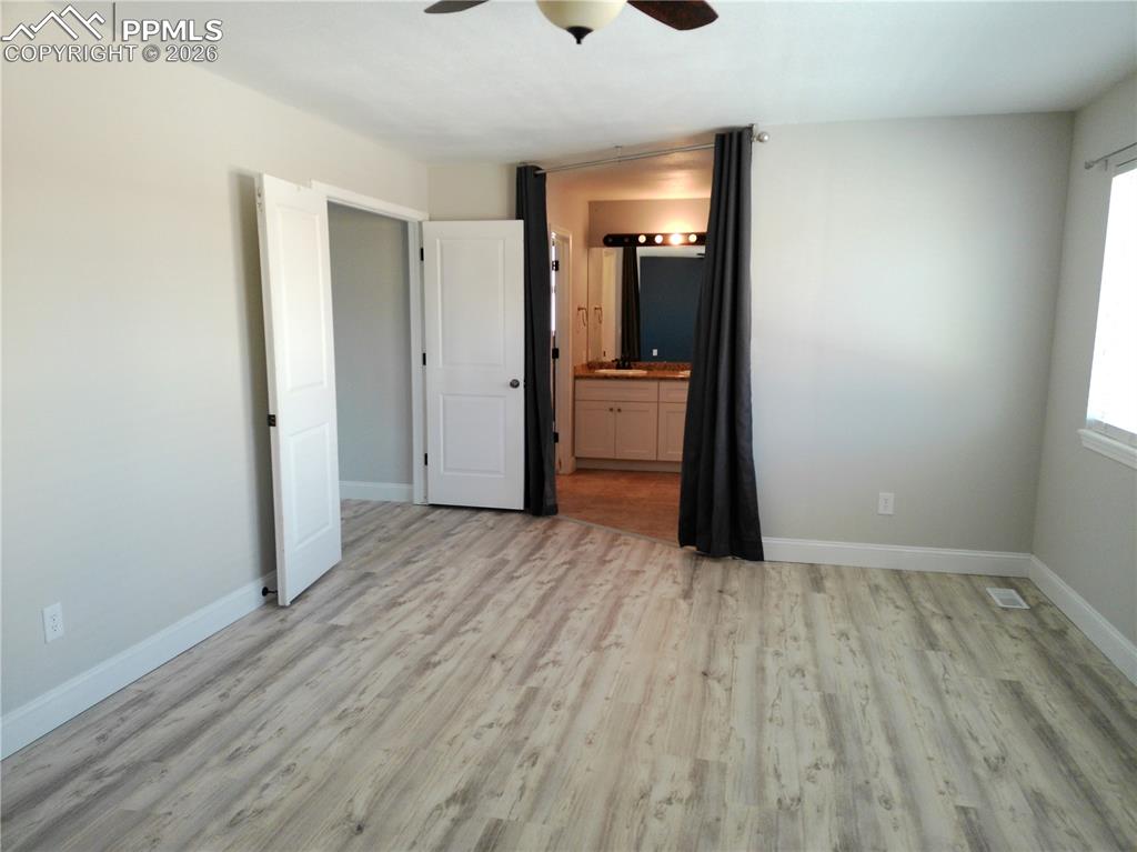 Image 20 of 50: Master Bedroom