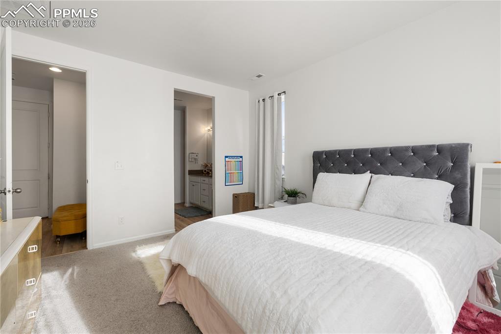 Image 18 of 38: Bedroom