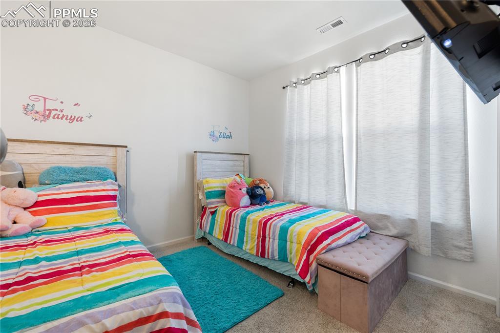 Image 22 of 38: Bedroom