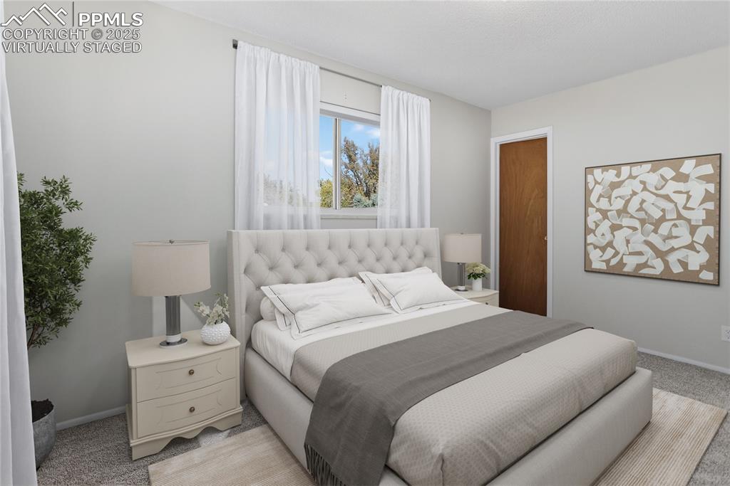 Image 17 of 42: Primary Bedroom - Virtually Staged - Fits a King bed.