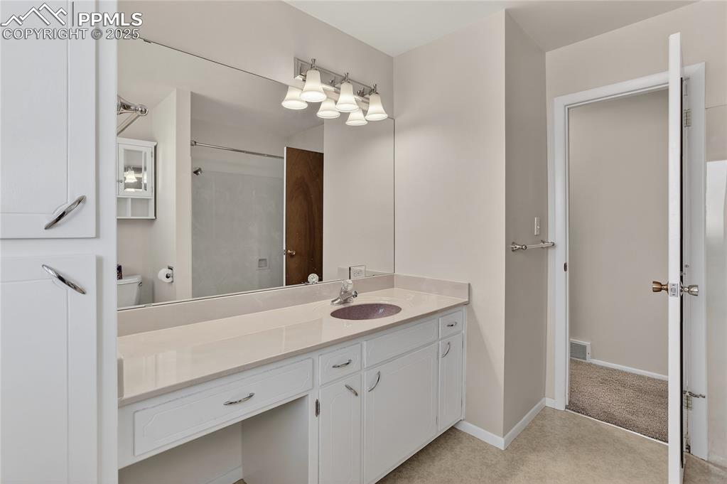 Image 21 of 42: Main Level Hall Bathroom