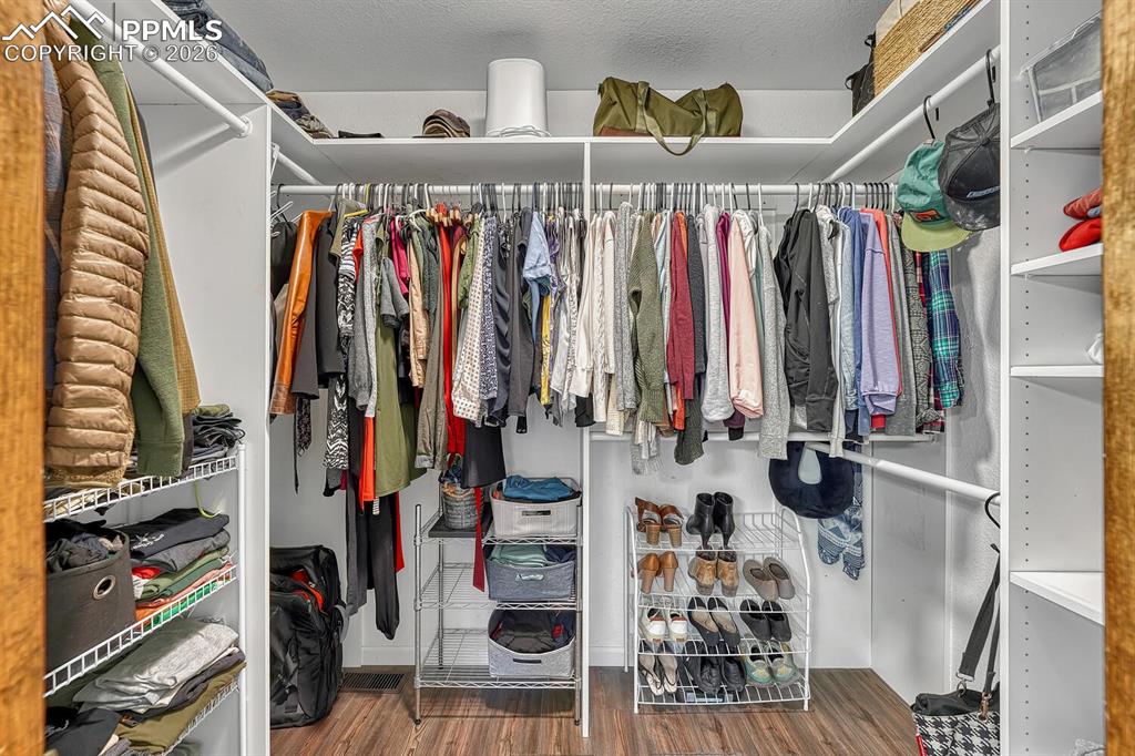 Image 32 of 45: Walk in primary closet