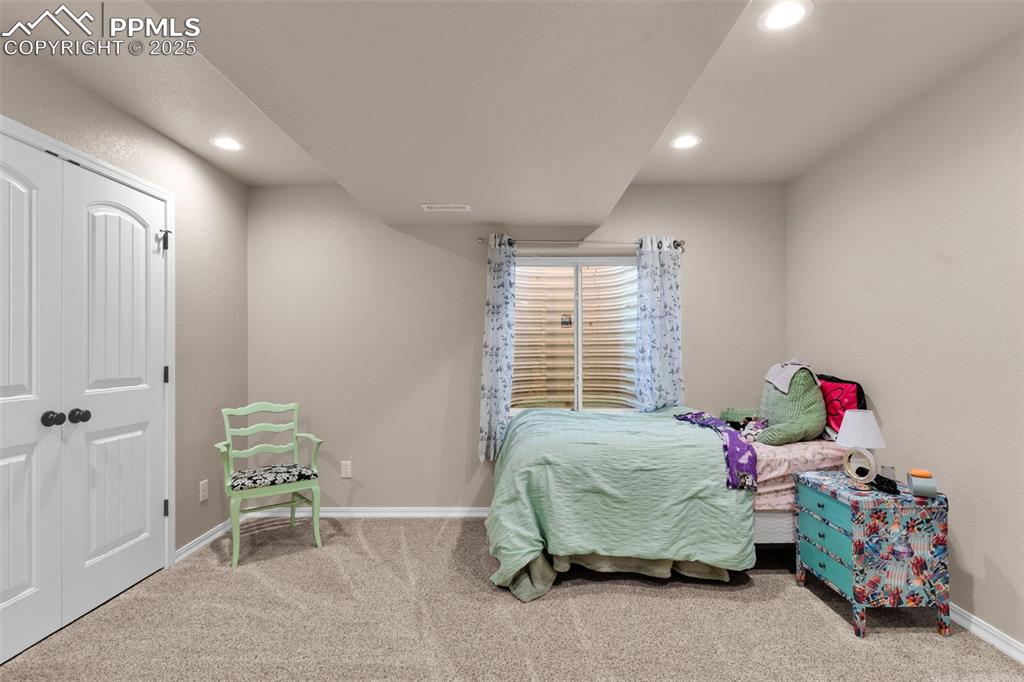 Image 26 of 39: Bedroom