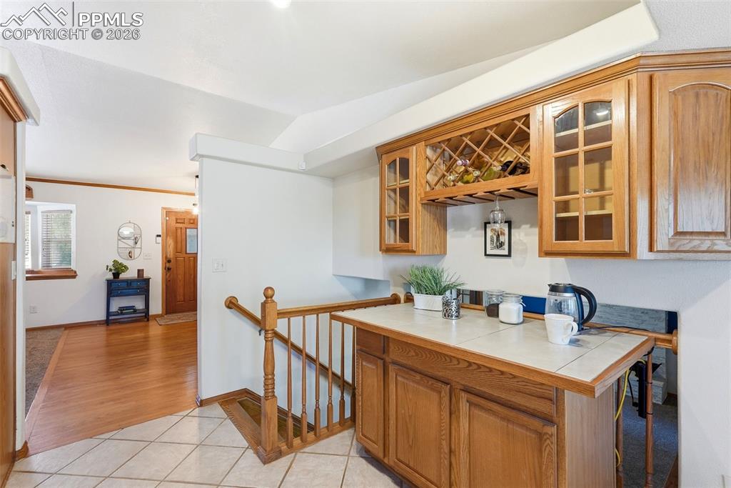 Image 11 of 50: Kitchen Bar And Coffee Station Built-Ins, Tile, Ceiling Fan