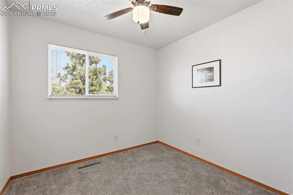 Image 20 of 50: Carpet, Wood Doors And Closets, Ceiling Fan
