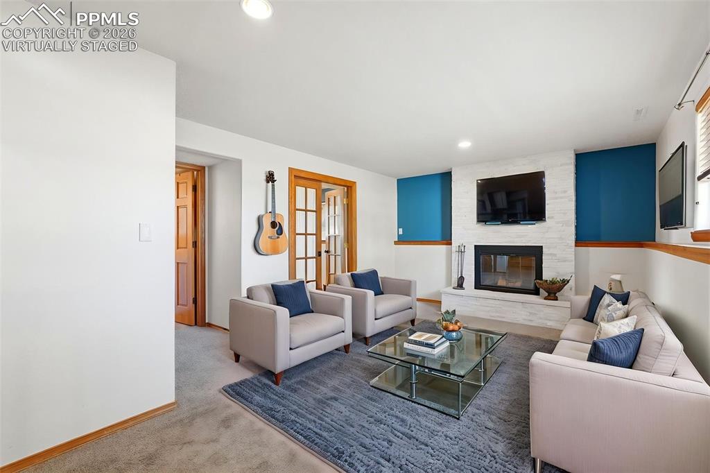 Image 32 of 50: Virtually Staged, Stone Fireplace, French Doors To Office, Extra Closet Sto