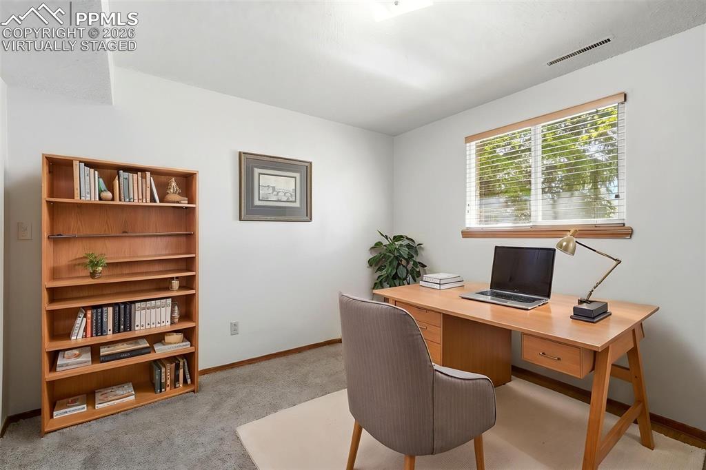 Image 35 of 50: Virtually Staged, Lower Level, Carpet, French Doors