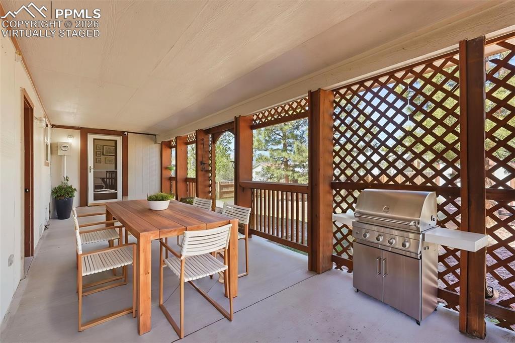 Image 43 of 50: Virtually Staged Covered Patio