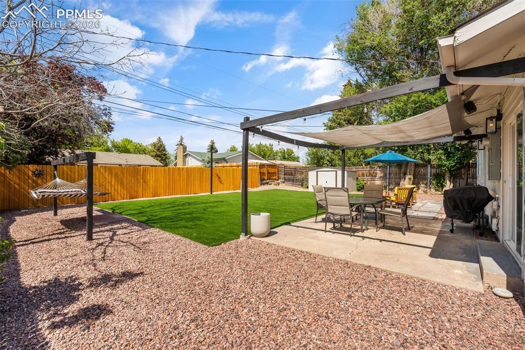 Image 10 of 34: Fully Fenced Backyard