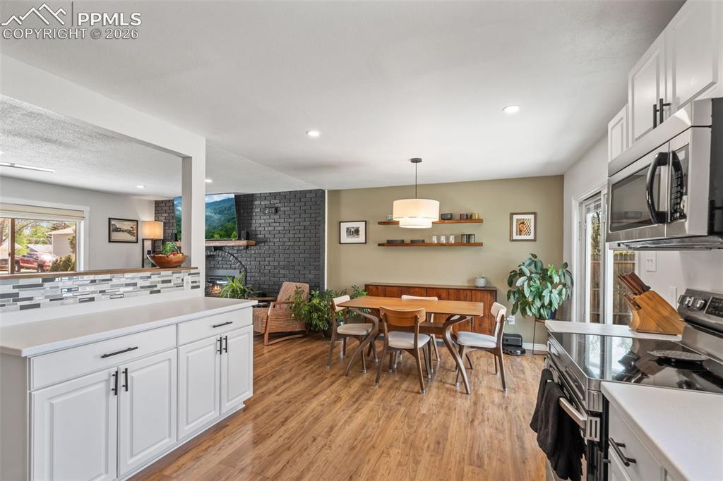 Image 15 of 34: Wood Plank Flooring throughout