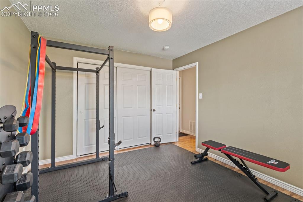 Image 18 of 34: Main level bedroom has large closet