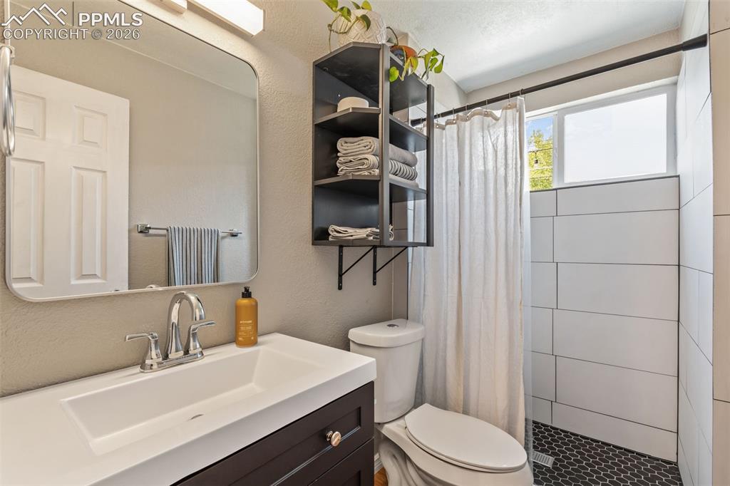 Image 19 of 34: Updated Main level bath