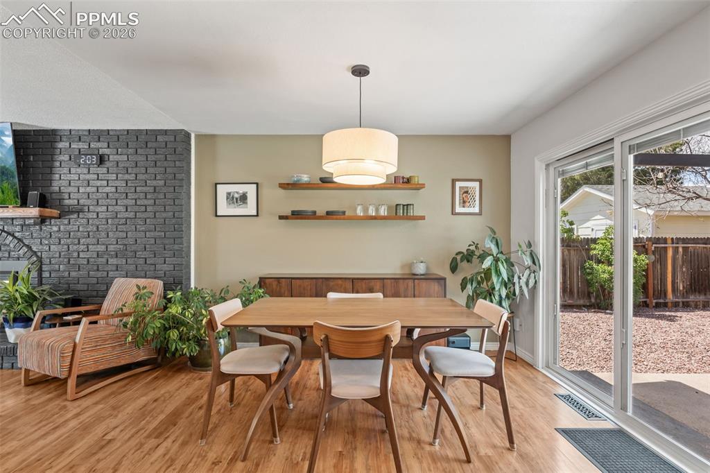 Image 9 of 34: Spacious dining area with walkout to patio
