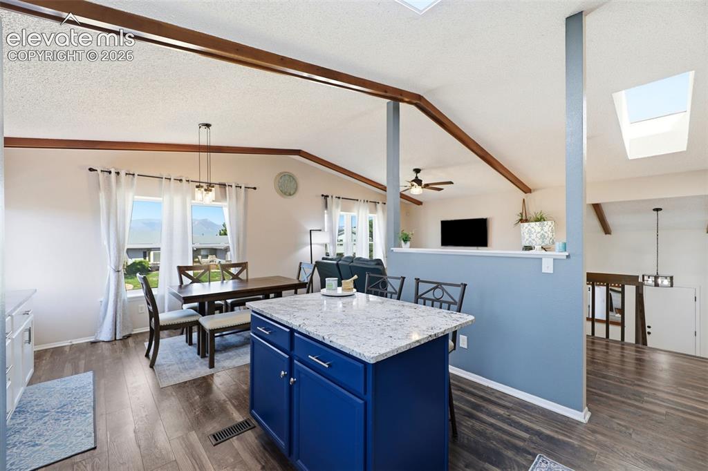 Image 10 of 37: Beautifully updated kitchen including fresh paint, new countertops and back