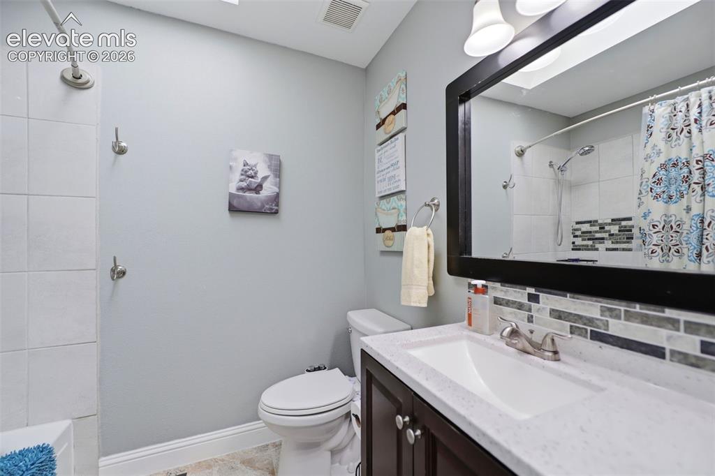 Image 21 of 37: Updated bathroom