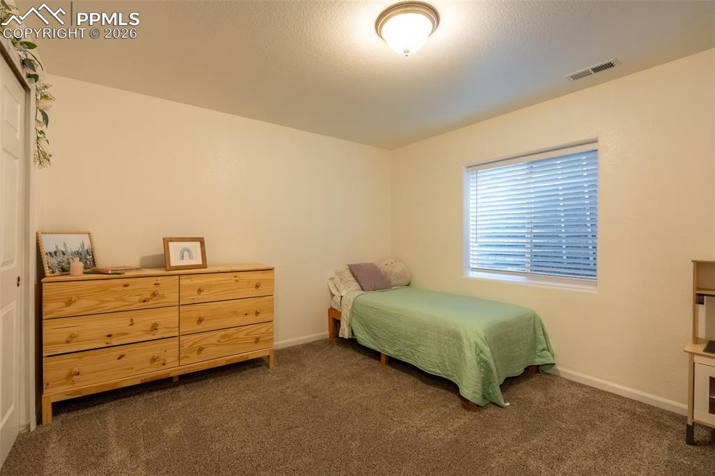 Image 31 of 39: Lower level, bedroom 2
