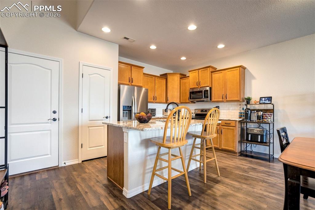 Image 17 of 48: Another view of the kitchen.