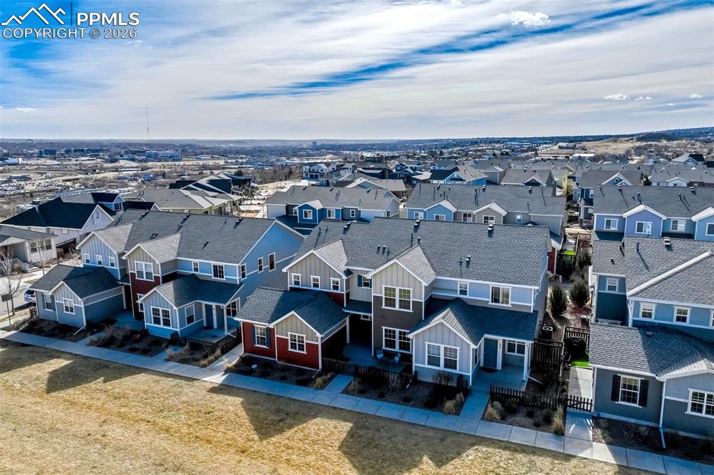 Image 43 of 48: Aerial view of the townhome. Showing the greenbelt area.