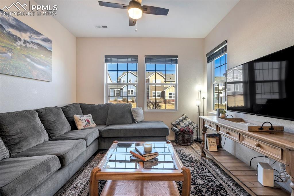 Image 6 of 48: Light filled Living area.