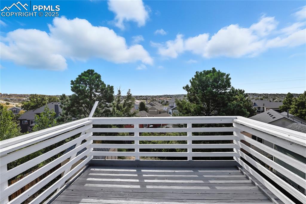 Image 23 of 32: Wooden deck featuring a residential view