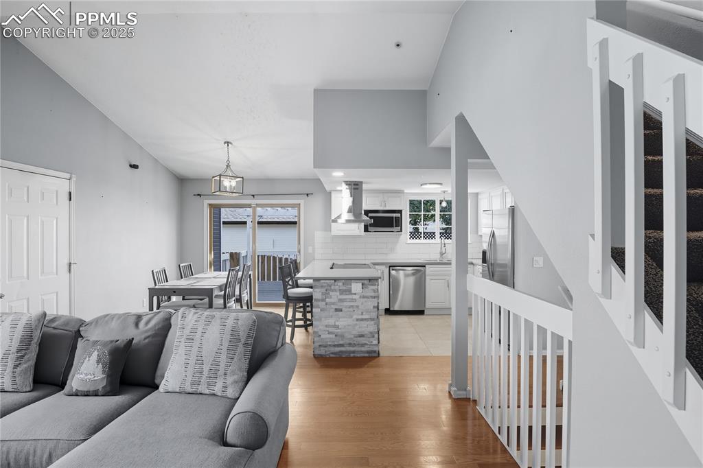 Image 9 of 32: Living area featuring light wood finished floors