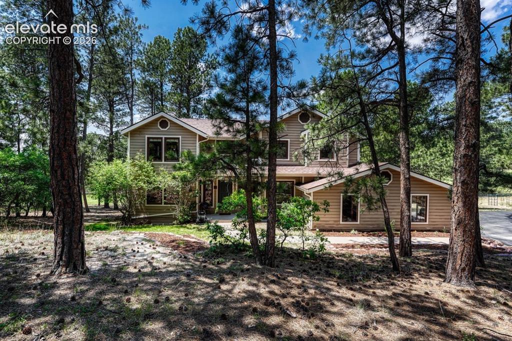 Image 1 of 49: Perfectly placed in the Pines 