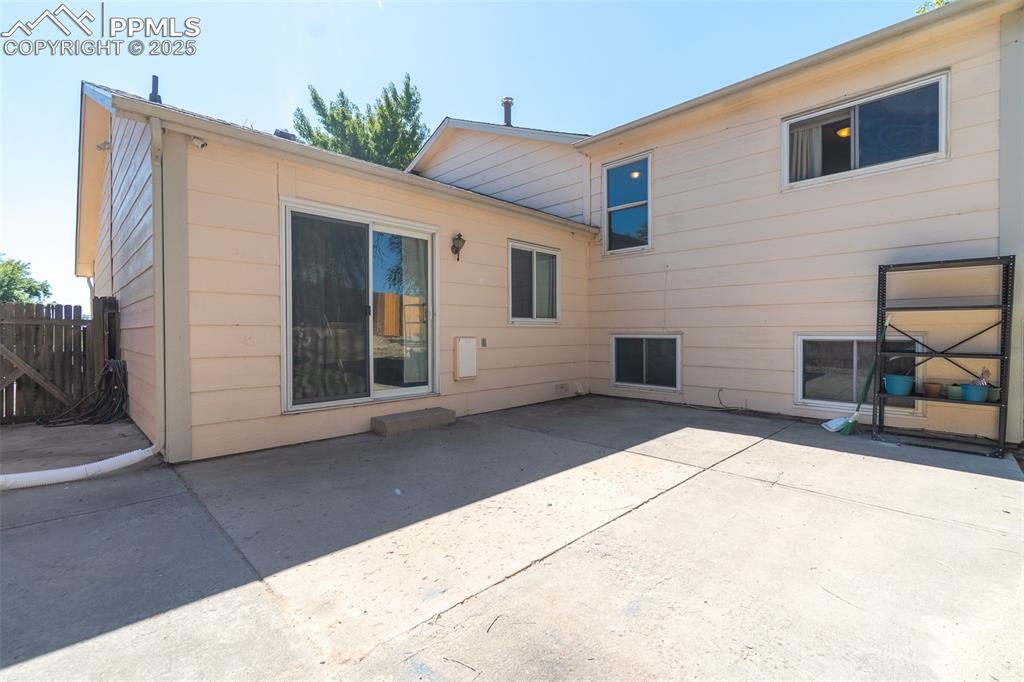 Image 38 of 42: Back of house featuring a patio