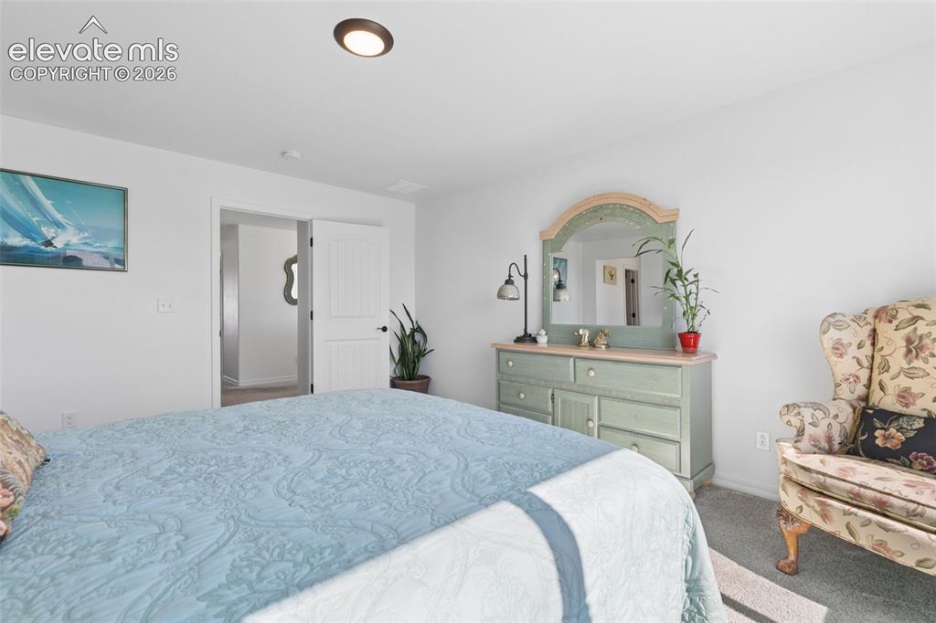 Image 12 of 26:  White interior doors, and neutral wall tones