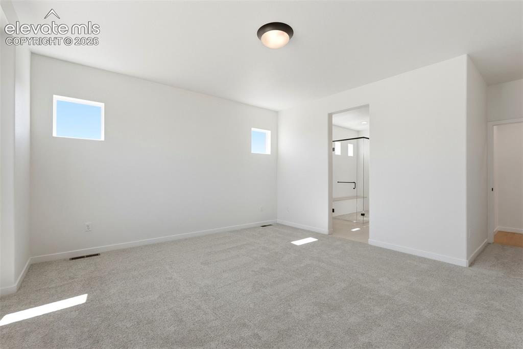 Image 21 of 39: Master Bedroom