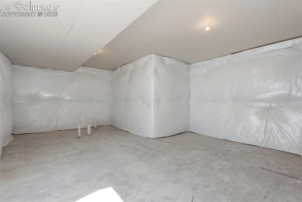 Image 23 of 28: Storage/Unfinished Guest Suite. Pre-plumbed for Bath