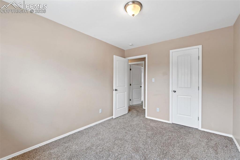 Image 23 of 40: Unfurnished bedroom featuring carpet floors and a closet