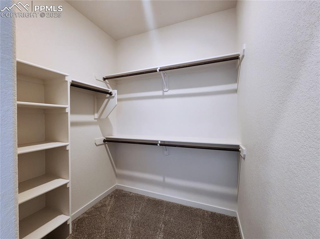 Image 16 of 31: Primary bedroom closet