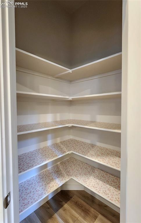 Image 7 of 31: Large walk-in pantry