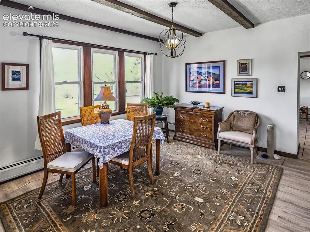 Image 4 of 27: Dedicated Dinin Space with All New Vinyl Low-E Windows