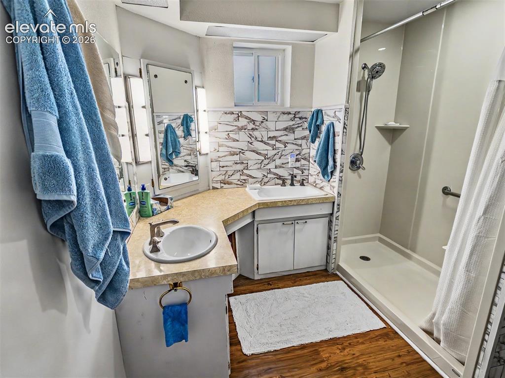 Image 9 of 27: Double Sink and Walk-in Shower