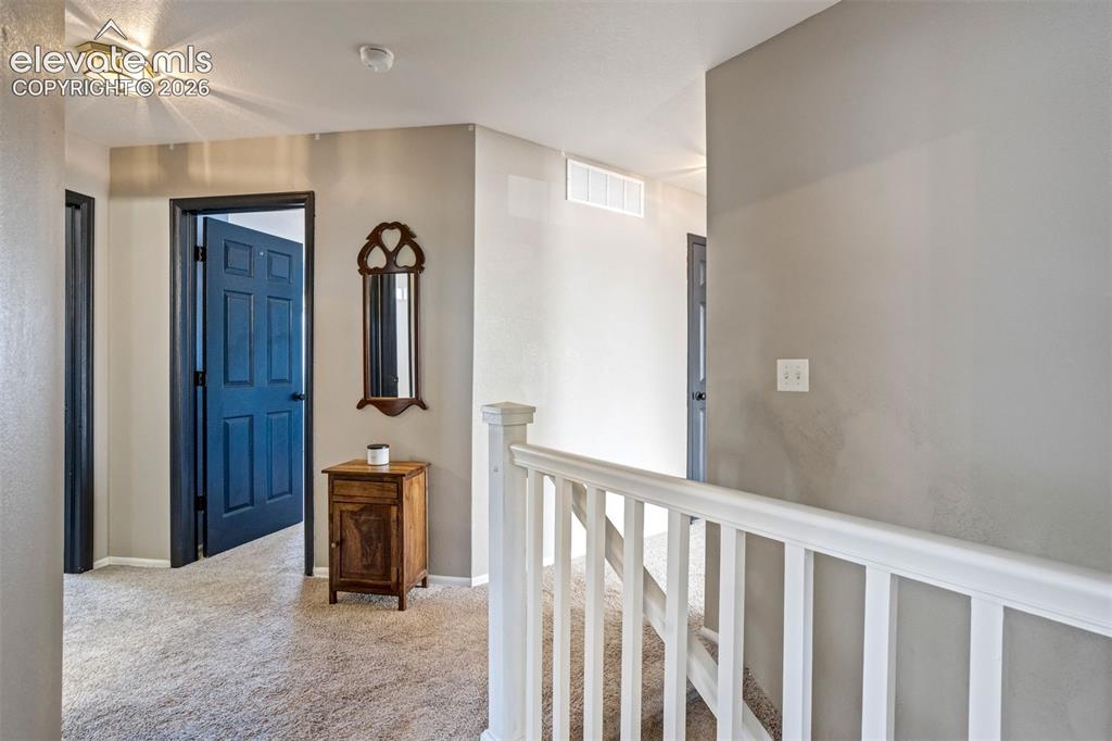 Image 19 of 48: Upstairs: 4Bdrms & Laundry Room
