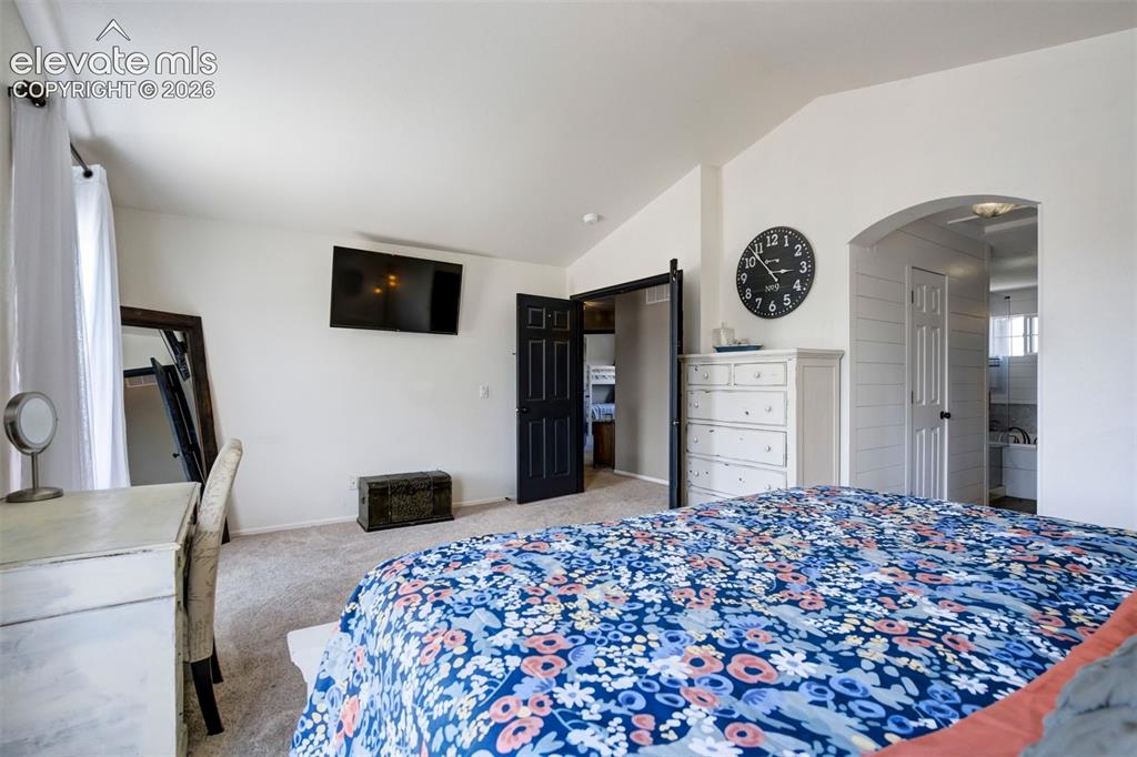 Image 21 of 48: Primary Bedroom - Spacious Retreat