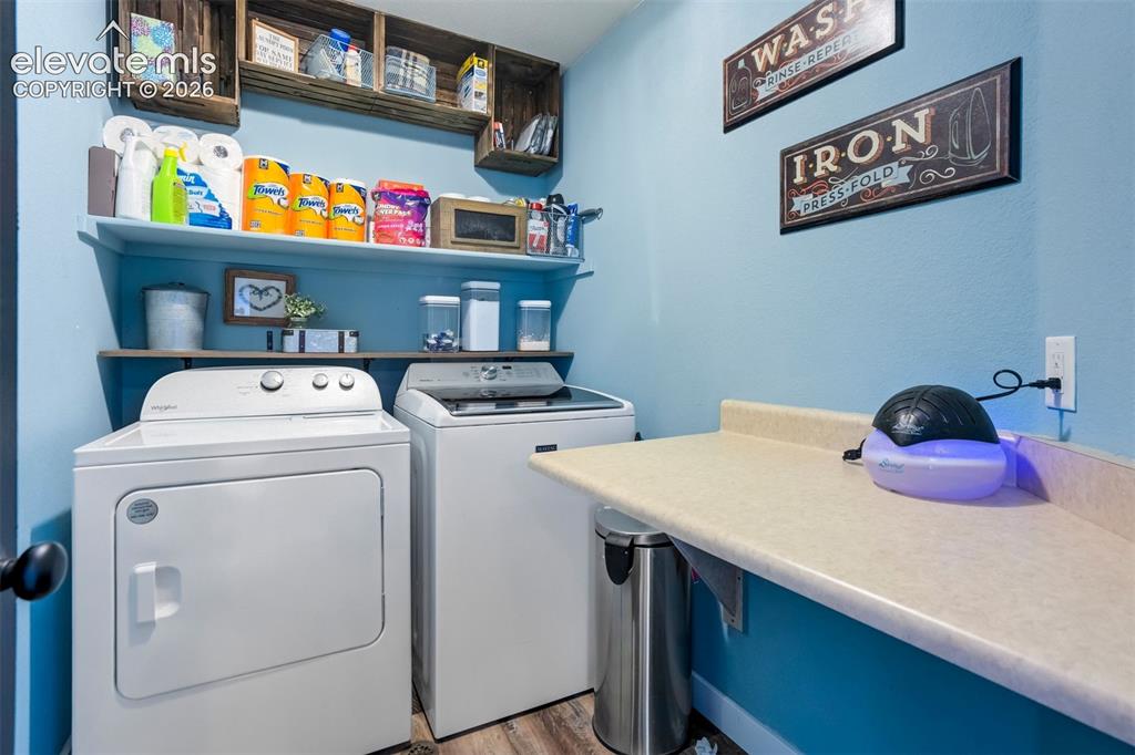Image 37 of 48: Upstairs: Laundry Room